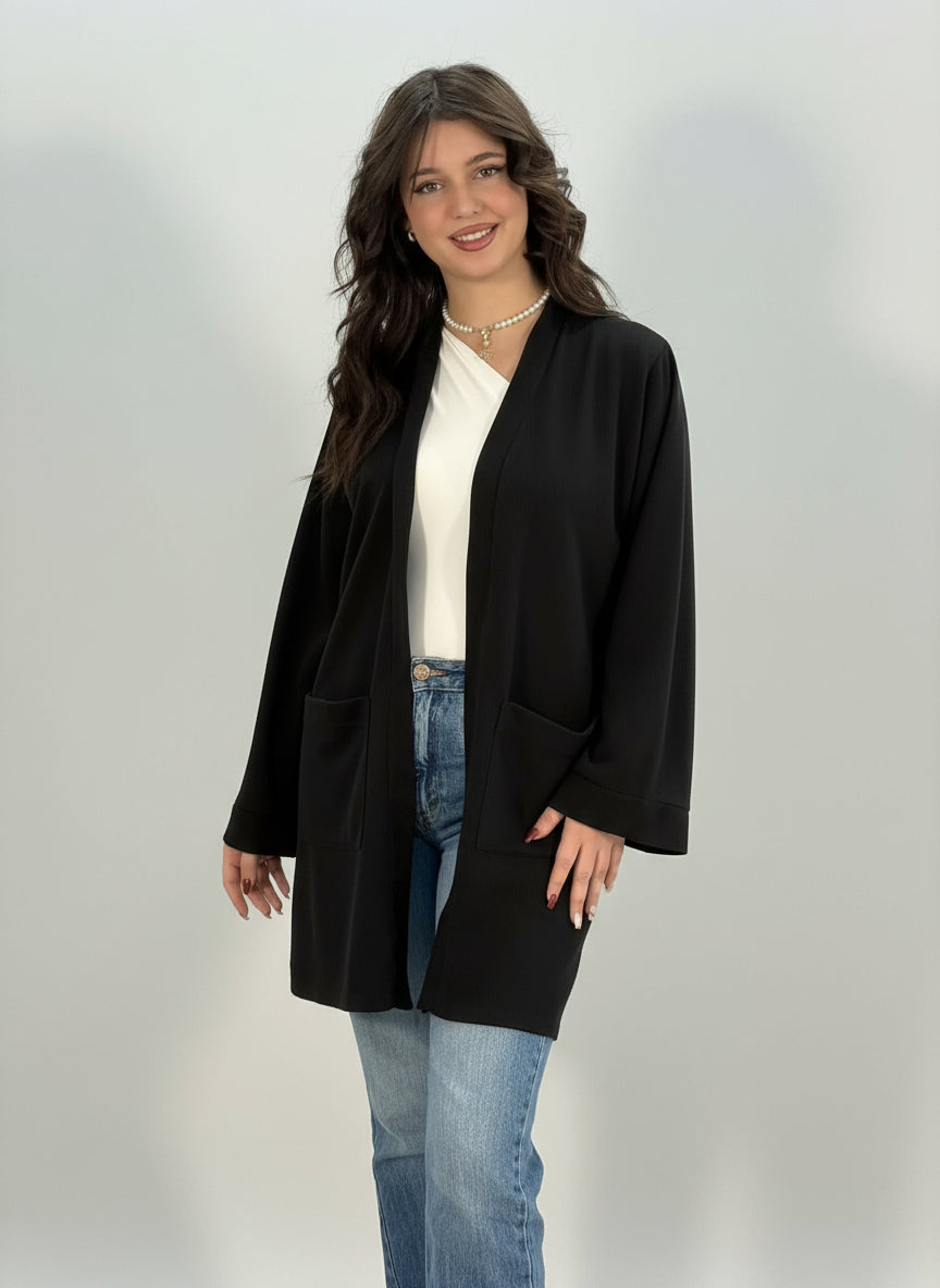 Gilet long en tricot avec grandes poches