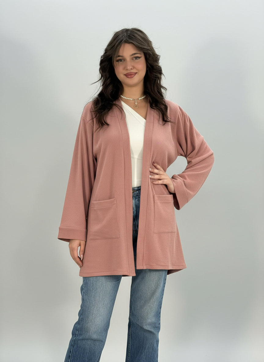 Gilet long en tricot avec grandes poches