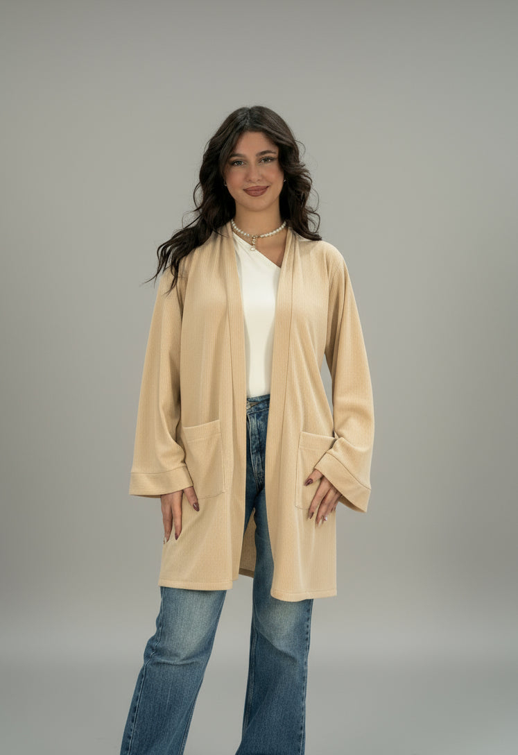 Gilet long en tricot avec grandes poches