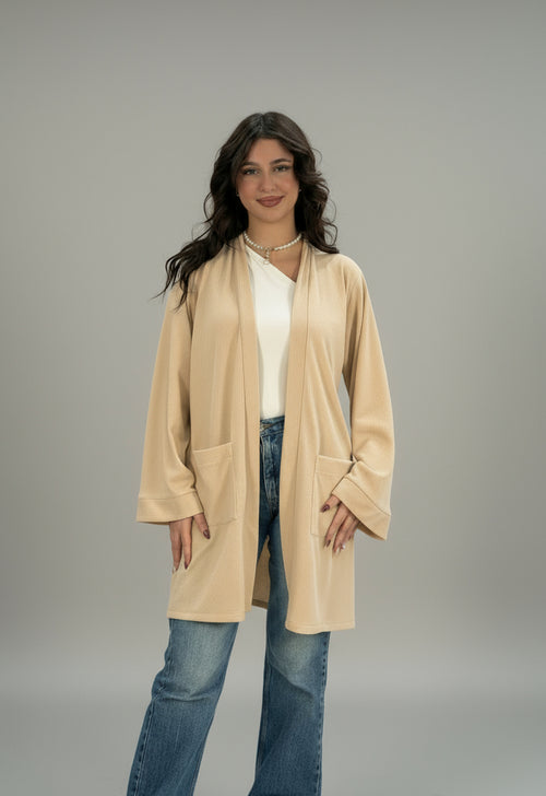 Gilet long en tricot avec grandes poches